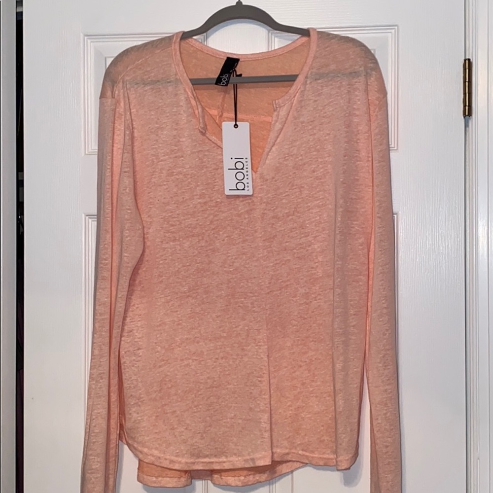 A very light shirt very causal and very cute.